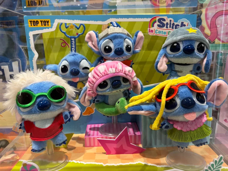 Stitch plush toys in different outfits